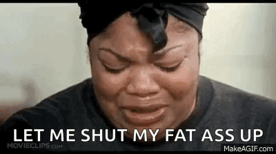 A Woman Is Crying With The Words `` Let Me Shut My Fat Ass Up '' Written On Her Face . GIF