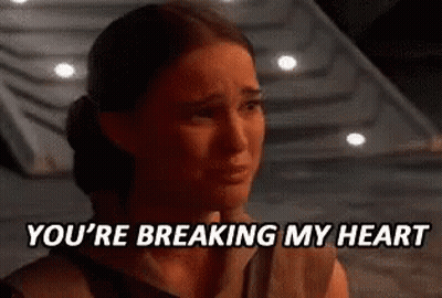 A Woman Is Crying With The Words `` You 'Re Breaking My Heart '' Written Above Her . GIF