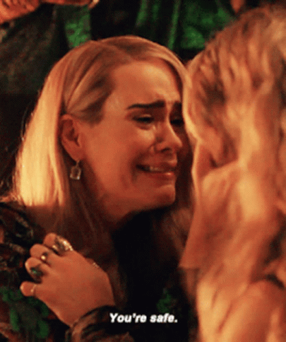 A Woman Is Crying With The Words You 'Re Safe Next To Her GIF