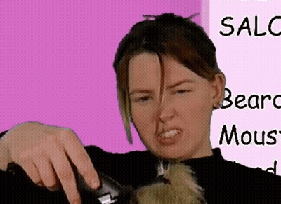 A Woman Is Cutting A Dog 'S Hair In Front Of A Pink Sign That Says Sale Bears Mous GIF