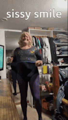 A Woman Is Dancing In A Room With The Words Sissy Smile Written Above Her . GIF