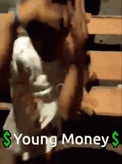 A Woman Is Dancing In A Room With The Words Young Money Written On The Bottom GIF