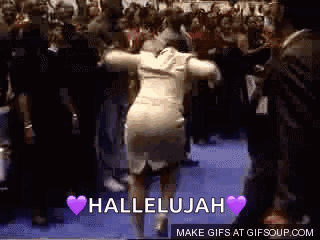 A Woman Is Dancing In Front Of A Crowd With The Words Hallelujah Written On The Screen . GIF