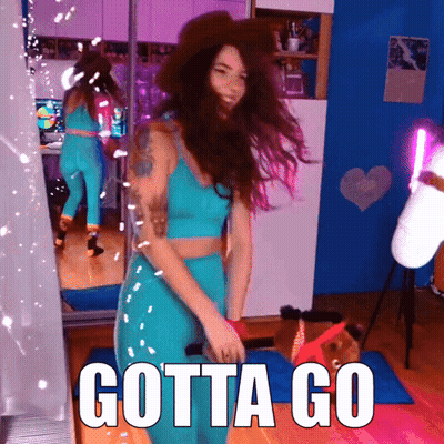 A Woman Is Dancing In Front Of A Mirror With The Words Gotta Go Written On It GIF