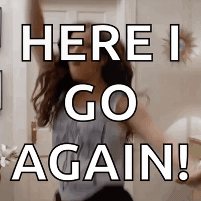 A Woman Is Dancing In Front Of A Sign That Says Here I Go Again . GIF