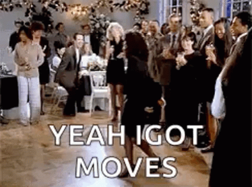 A Woman Is Dancing On A Dance Floor In Front Of A Crowd Of People With The Words `` Yeah I Got Moves '' . GIF