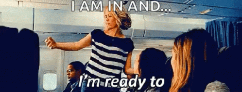 A Woman Is Dancing On A Plane With The Words I Am In And I 'M Ready To GIF