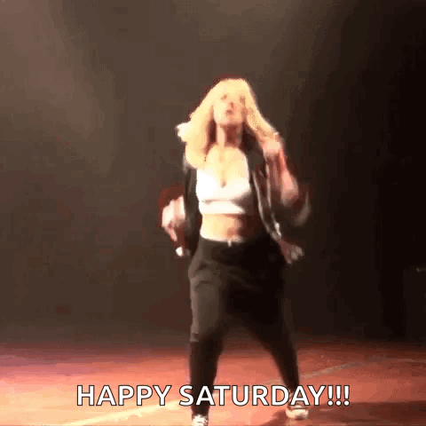 A Woman Is Dancing On A Stage And The Caption Says Happy Saturday !!! GIF