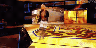 A Woman Is Dancing On A Stage With The Words " Nextbigthing " Written On The Bottom GIF