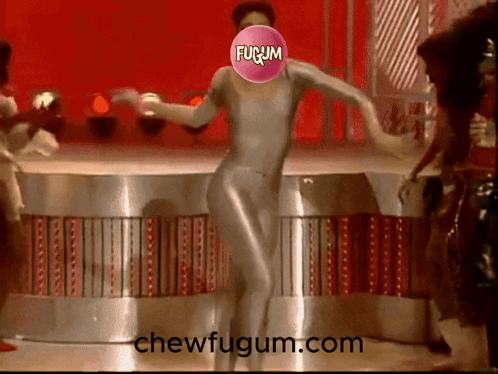 A Woman Is Dancing With A Fugum Bubble In Front Of Her Face GIF