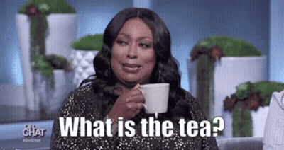 A Woman Is Drinking A Cup Of Tea And Saying What Is The Tea . GIF