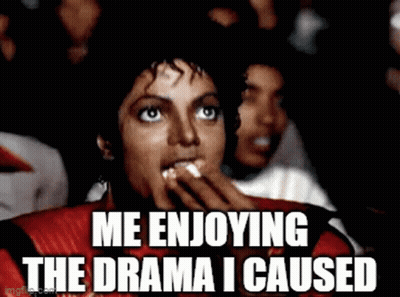 A Woman Is Eating Popcorn While Watching A Movie And The Caption Says Me Enjoying The Drama I Caused GIF