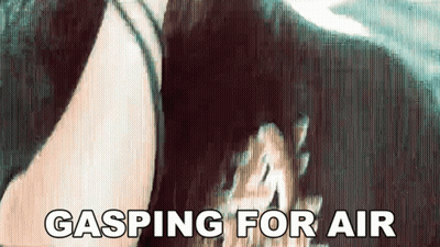 A Woman Is Gasping For Air While Holding A Dog 'S Head GIF