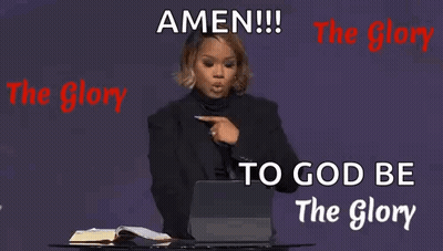 A Woman Is Giving A Speech In Front Of A Laptop Computer While Pointing At It . GIF