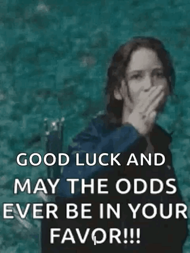 A Woman Is Giving The Middle Finger And Saying `` Good Luck And May The Odds Ever Be In Your Favor !!! '' GIF