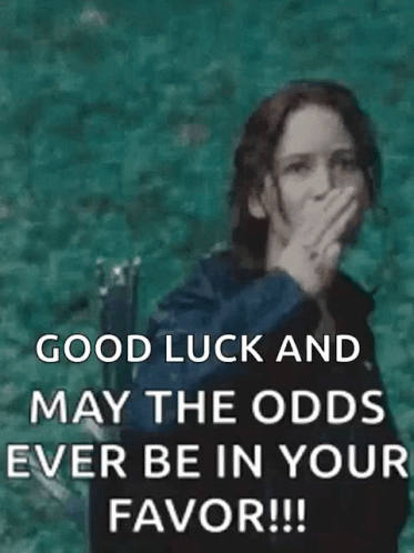 A Woman Is Giving The Middle Finger And Saying `` Good Luck And May The Odds Ever Be In Your Favor !!! '' GIF