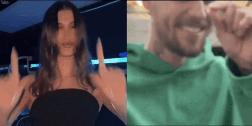 A Woman Is Giving The Middle Finger To A Man In A Green Sweatshirt . GIF