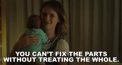 A Woman Is Holding A Baby And Saying `` You Can T Fix The Parts Without Treating The Whole . '' GIF