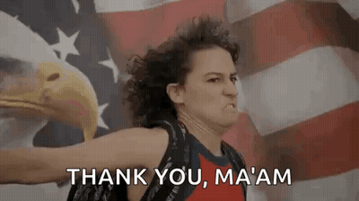 A Woman Is Holding A Bald Eagle In Front Of An American Flag And Saying `` Thank You , Ma Am '' . GIF