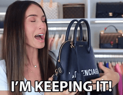 A Woman Is Holding A Black Balenciaga Purse And Says I 'M Keeping It GIF