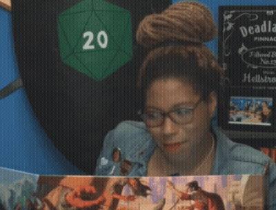 A Woman Is Holding A Book With The Words Too Soon Too Soon Written On It GIF