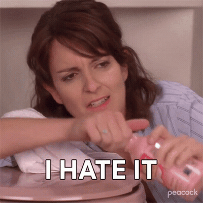A Woman Is Holding A Bottle Of Baby Lotion And Says I Hate It . GIF