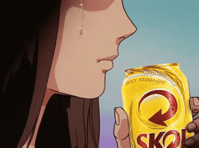 A Woman Is Holding A Can Of Skol Beer GIF