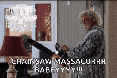 a woman is holding a chainsaw in a living room and saying chainsaw massacurr babeyyy !!!