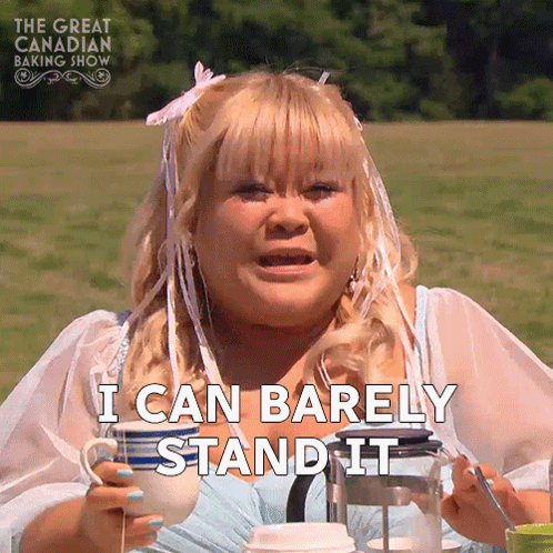 A Woman Is Holding A Cup Of Coffee And Says I Can Barely Stand It GIF