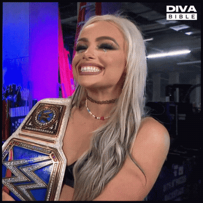 A Woman Is Holding A Diva Bible Belt GIF