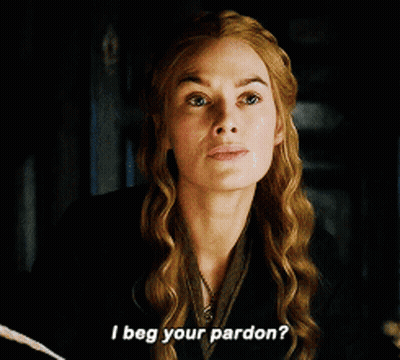 A Woman Is Holding A Feather And Asking If She Begs Your Pardon GIF