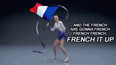 A Woman Is Holding A French Flag And Dancing With A Ribbon GIF