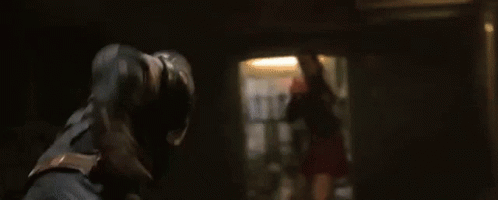 Woman Holding Gun In Dark Room With Keys GIF