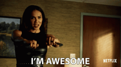A Woman Is Holding A Knife And Says I 'M Awesome In Front Of A Netflix Logo GIF