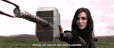 A Woman Is Holding A Large Hammer In A Field And Says `` Darling , You Have No Idea What Is Possible . '' GIF