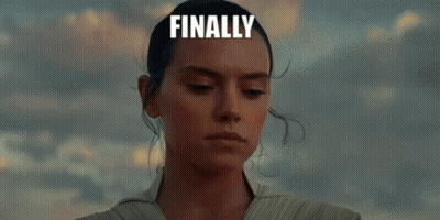A Woman Is Holding A Lightsaber In Her Hand With The Words `` Finally Pee Lightsaber '' Written On It . GIF