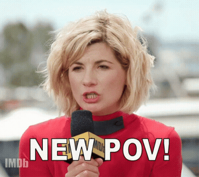 A Woman Is Holding A Microphone And Saying New Pov GIF