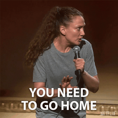 A Woman Is Holding A Microphone And Says " You Need To Go Home " GIF