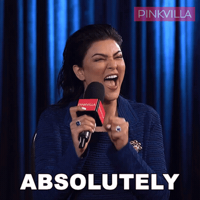 A Woman Is Holding A Microphone And The Word Absolutely Is On The Bottom GIF