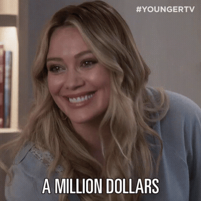A Woman Is Holding A Piece Of Paper With The Words A Million Dollars Written On It GIF