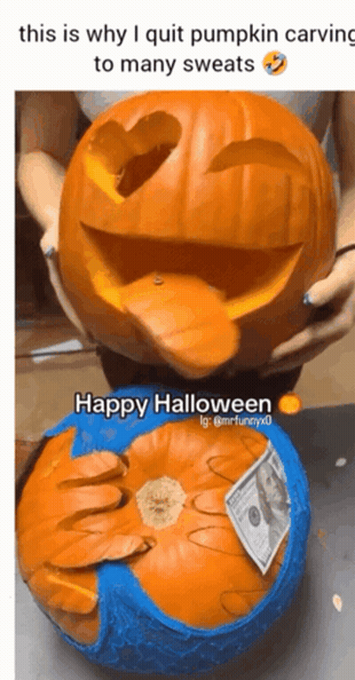 A Woman Is Holding A Pumpkin Carved To Look Like A Duck GIF