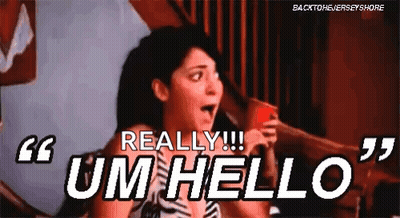 A Woman Is Holding A Red Cup And Saying `` Um Hello '' While Sitting On A Bed . GIF
