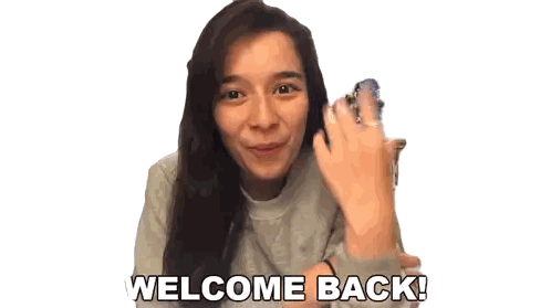 A Woman Is Holding A Ring In Her Hand And Says Welcome Back Sticker