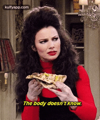 A Woman Is Holding A Slice Of Pizza In Her Hands And Saying `` The Body Does N't Know '' . GIF