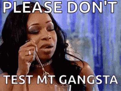 A Woman Is Holding A Spoon In Her Mouth And A Meme Says Please Don 'T Test Mt Gangsta GIF