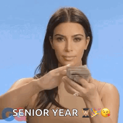 A Woman Is Holding A Stack Of Money In Her Hand And The Words Senior Year Are On The Bottom GIF