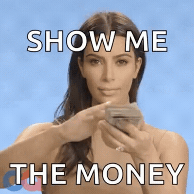 A Woman Is Holding A Stack Of Money In Her Hands . GIF