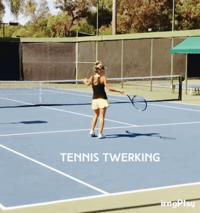 A Woman Is Holding A Tennis Racquet On A Tennis Court With The Words Tennis Twerking Above Her GIF