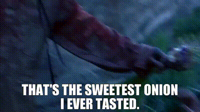 A Woman Is Holding An Onion And Saying That 'S The Sweetest Onion I Ever Tasted GIF