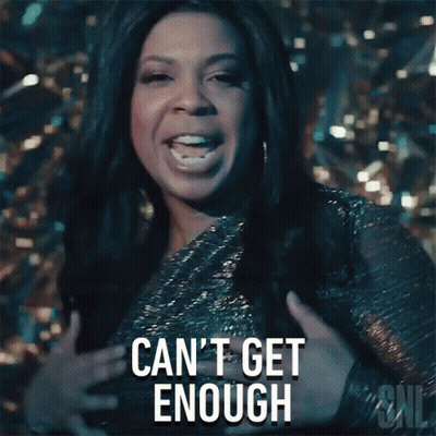 A Woman Is Holding Her Chest And Says Can 'T Get Enough GIF